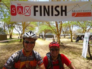 Jon and Jude at the finish line of the 10 to 4 - tired and dusty