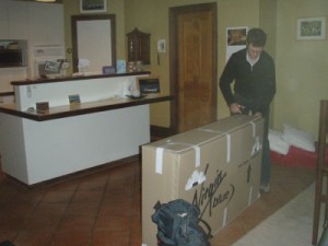 packing up the bike box at home