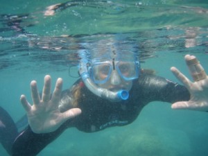 snorkelling to one of the CPs - you can see the 2 fingers still taped together because of a broken index finger
