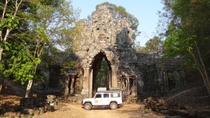 Lara in Cambodia, Siem Reap in front of the little known and little visited East Gate of Angkor Thom.