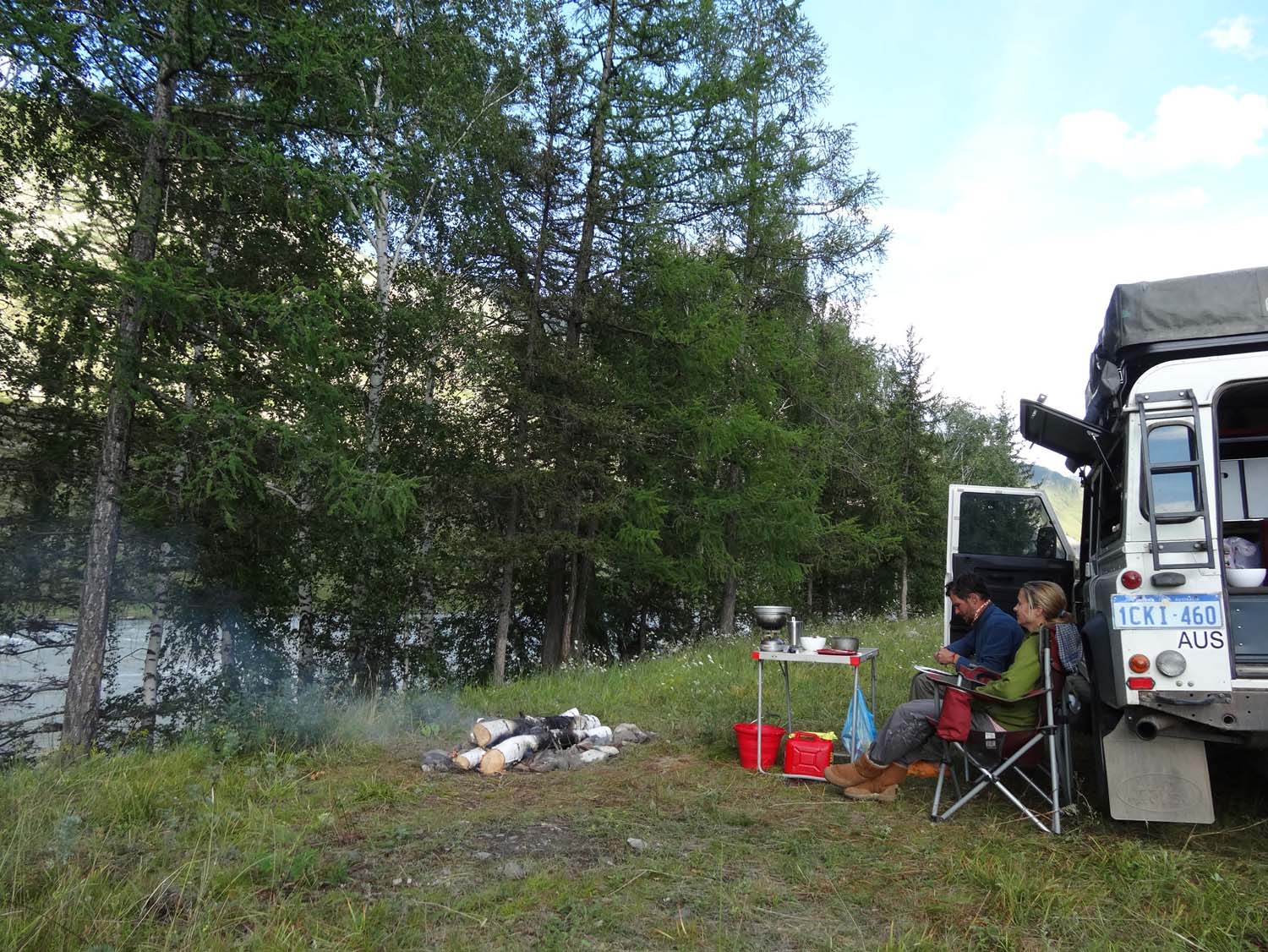 camp fire by the river - great camp site on the chutsky trakt