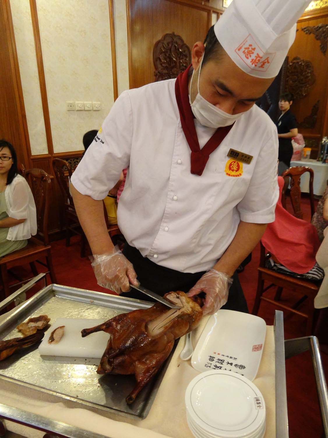 Peking Duck being carved up for us