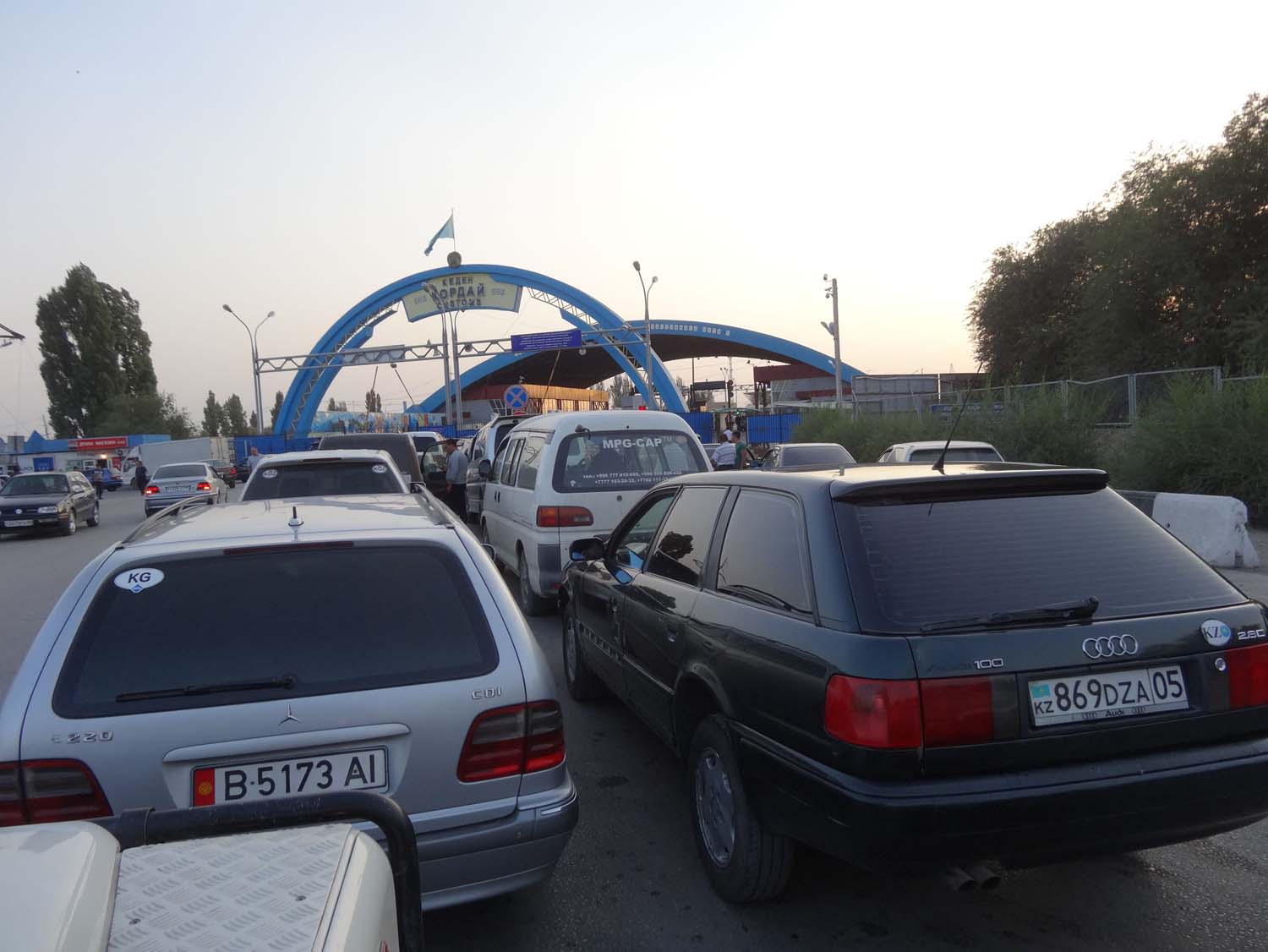 the rows of cars just outside the border from Kazakhstan to Kyrgyzstan (near Bishkek)