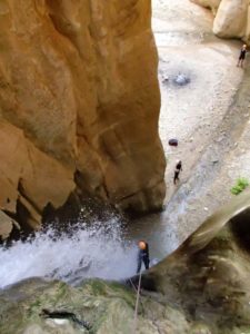Jude going down one of the waterfalls in Wadi Karak