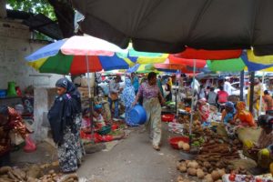 local market in the Comoros, if you look carefully you can spot some more ladies with the beauty mask
