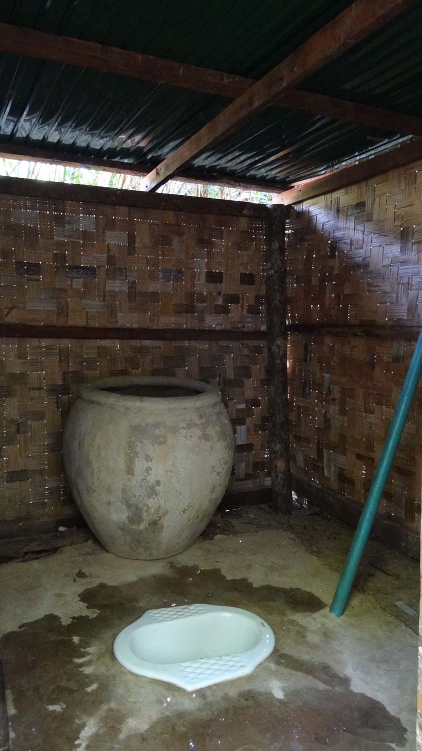 random toilet, the big stone pot has the water in it to flush