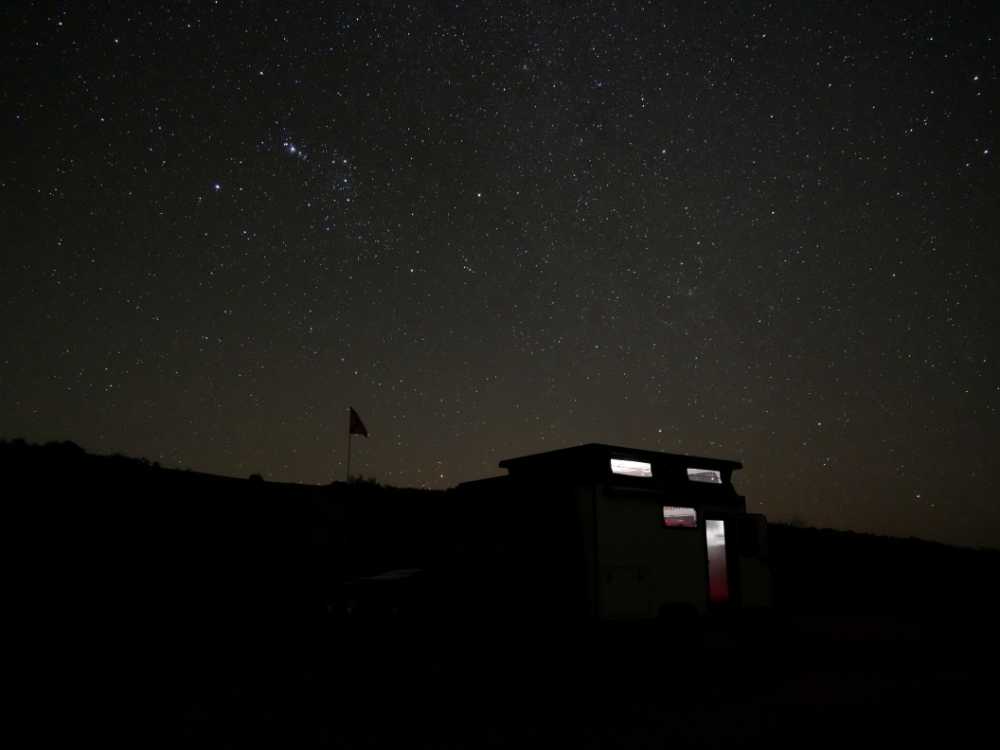 Lara with the night sky at our dune