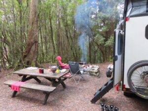 Jude relaxing with a cold Matso's ginger beer at the Huon campsite where you are allowed to have a fire. Perfect ending to a perfect hike!
