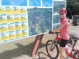 Jude at the map of the Derby mountain biking trails