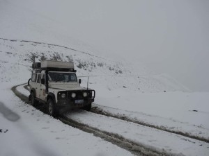 Lara in the first snow of the season near Arslandbob, Kyrgyzstan.