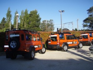 Land Rovers parked outside the hotel where we have some more tests