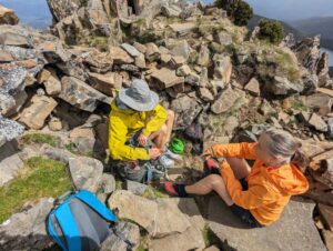 having lunch in a sheltered spot on top of Hartz Peak, the wind made it a bit chilly