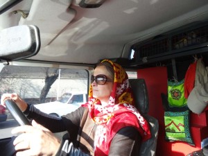 Driving in Iran means driving with a headscarf for Jude.