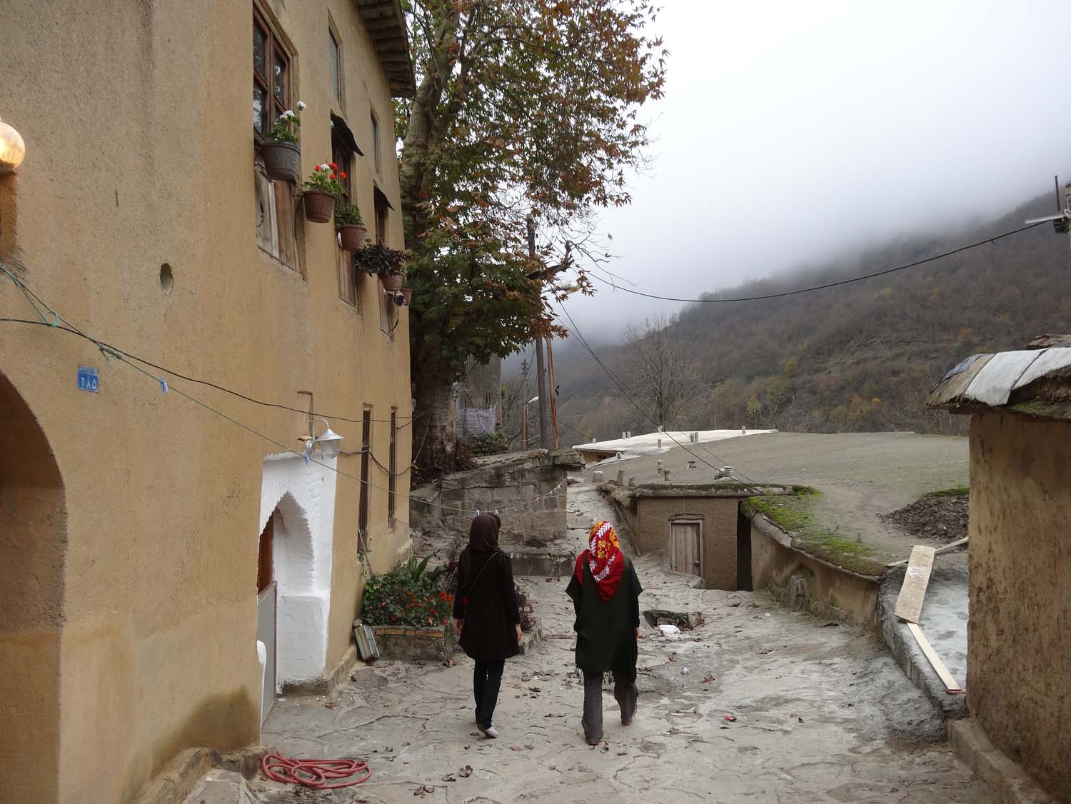 Assa and Jude walking through Masouleh