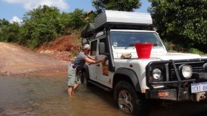 Creek crossings are excellent places to wash Lara. This is in Namtha, Laos.