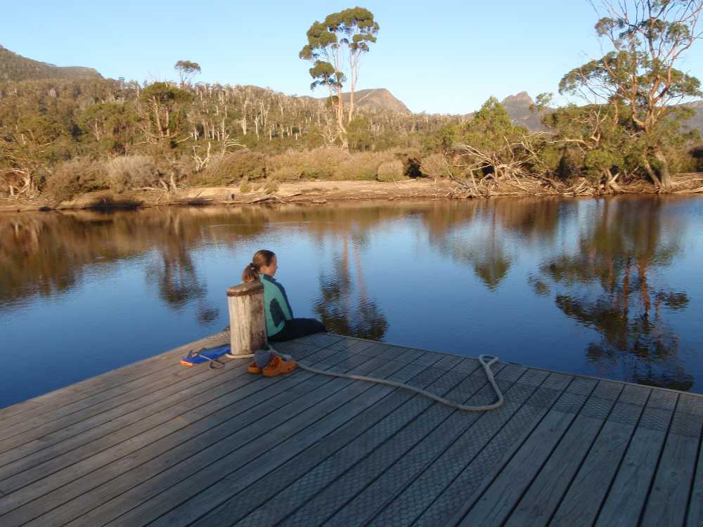 Jude on the jetty of the ferry at Narcissus Hut, looking for platypus but unfortunately we don't see any