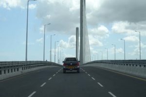 the new bridge, smooth tarmac, three lanes, hardly any traffic and a 60km per hour speed limit after a ramp access speed of 30...