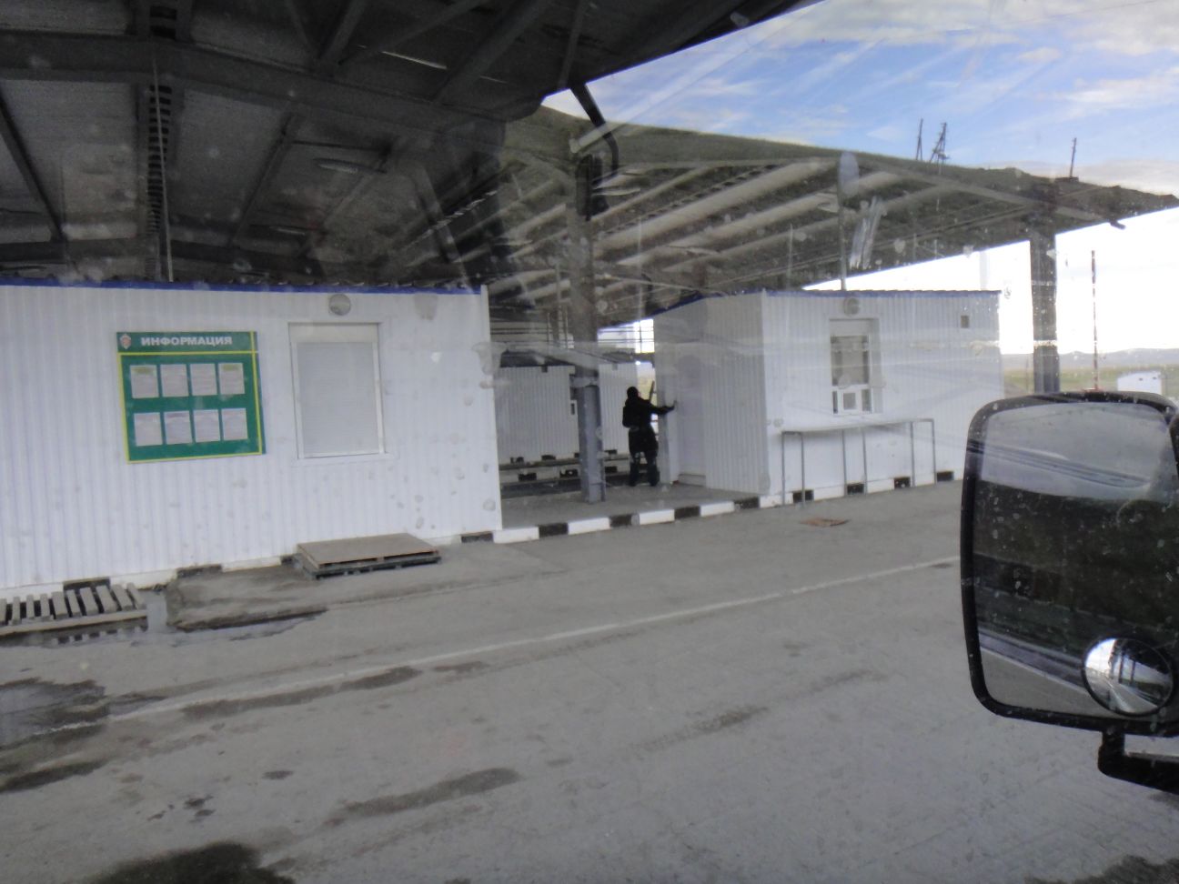 the undercover area with passport control (left)and customs offices (right) visible 