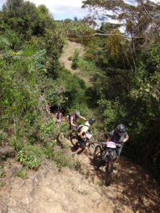 one of the steep hike-a-bike sections - Helen, James and Jon