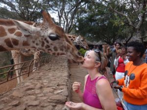 Jude giving the giraffe a kiss