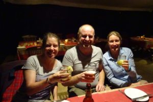 Chaka camp - the ladies drinking 'dawa' - east africa's best medicine, and Mel has a Kilimanjaro beer