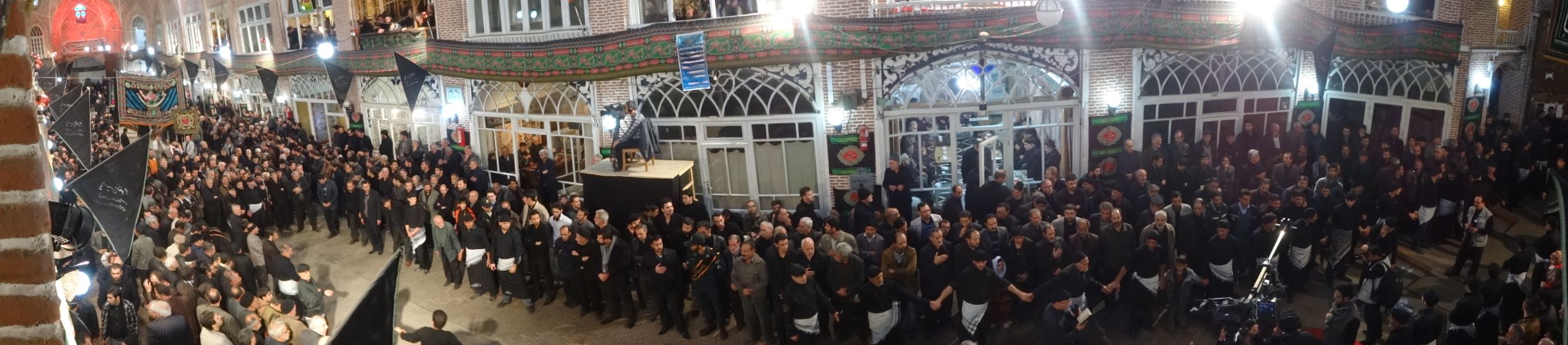 Tabriz bazaar - watching the commemoration of Imam Hoessein from the first floor of the carpet shops in Tabriz