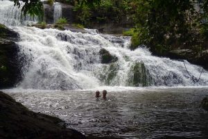 Jon and Jude enjoy a swim in the refreshing waters of the Songo waterfall